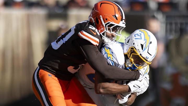 Devin Bush wraps up J.K. Dobbins with a tackle. Bush's tackling has consistently been more effective than that of former Bears linebacker Tremaine Edmunds. Devin Bush wraps up J.K. Dobbins with a tackle. Bush's tackling has consistently been more effective than that of former Bears linebacker Tremaine Edmunds.