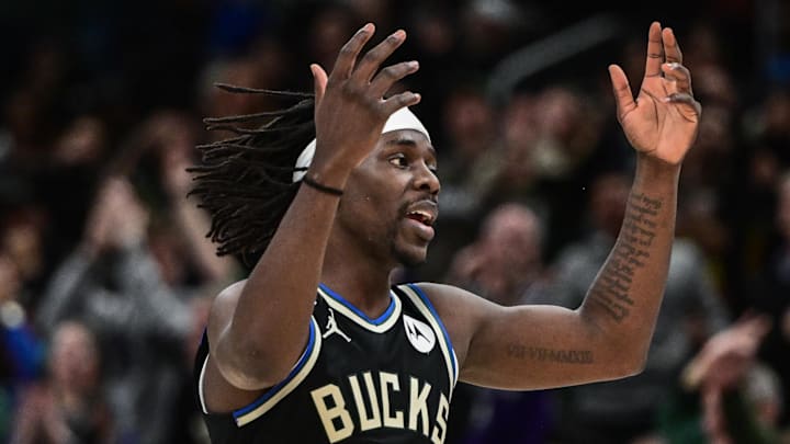Milwaukee Bucks guard Jrue Holiday (21) reacts after scoring a basket in the fourth quarter during a game against the Boston Celtics at Fiserv Forum on February 14, 2023.