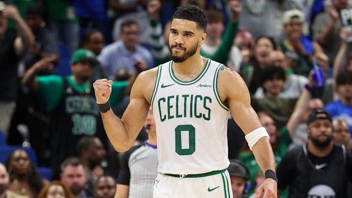 Apr 27, 2025; Orlando, Florida, USA; Boston Celtics forward Jayson Tatum (0) reacts after beating the Orlando Magic in game four of first round for the 2025 NBA Playoffs at Kia Center. Mandatory Credit: Nathan Ray Seebeck-Imagn Images