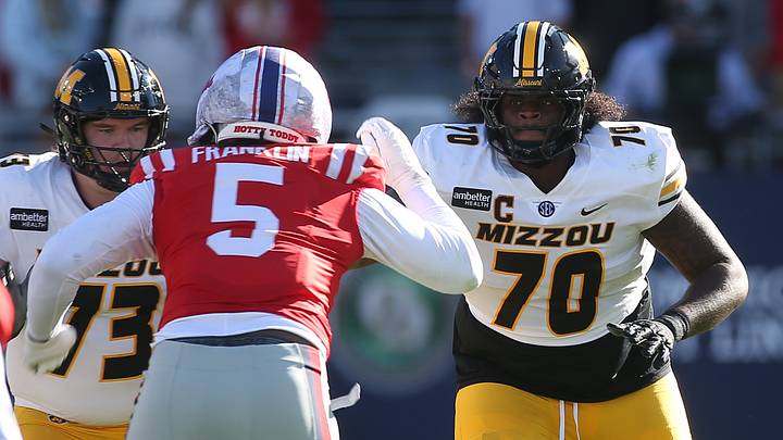 Oct 17, 2026; Oxford, Mississippi, USA;  Missouri Tigers offensive line Cayden Green (70) and offensive line Tristan Wilson (73) block against Mississippi Rebels defensive end Kam Franklin (5) during the first half at Vaught-Hemingway Stadium.  Mandatory Credit: Petre Thomas-Imagn Images