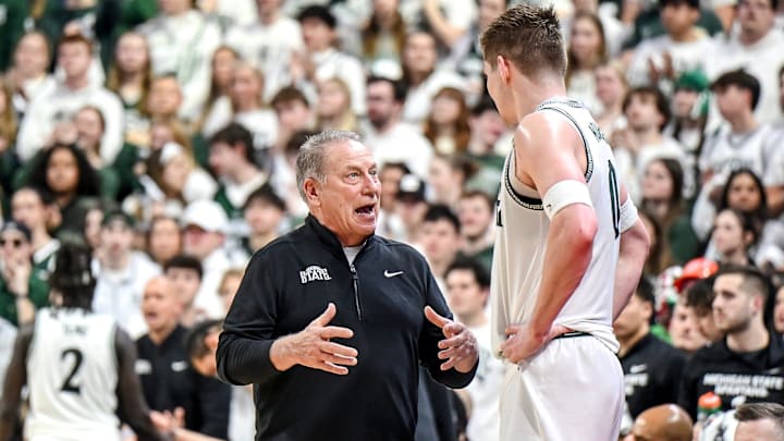 Michigan State's head coach Tom Izzo, left, talks with Jaxon Kohler UCLA's during the first half on Tuesday, Feb. 17, 2026, at the Breslin Center in East Lansing.