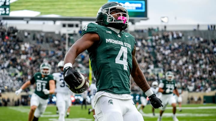 Michigan State's Elijah Tau-Tolliver celebrates his touchdown against Penn State during the first quarter on Saturday, Nov. 15, 2025, at Spartan Stadium in East Lansing.