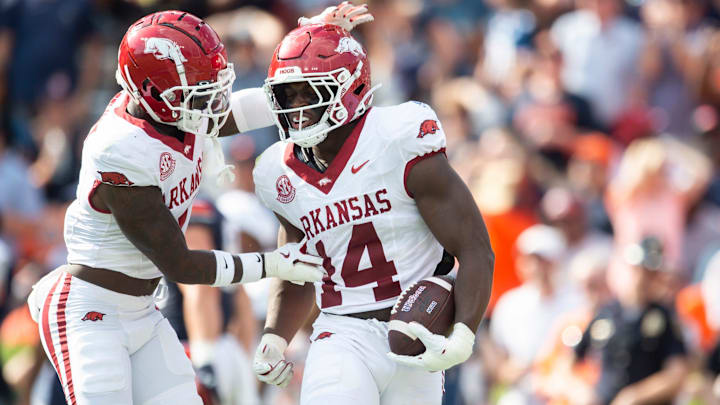Arkansas Razorbacks linebacker Stephen Dix Jr. (14) celebrates his fumble recovery as Auburn Tigers take on Arkansas Razorbacks at Jordan-Hare Stadium in Auburn, Ala., on Saturday, Sept. 21, 2024. Arkansas Razorbacks lead Auburn Tigers 7-0 at halftime.