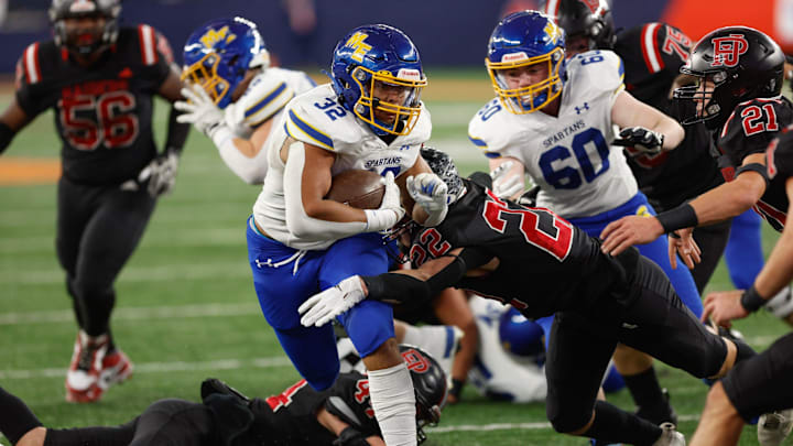 Port Jervis linebacker Ben Rivera (22) goes for a tackle against Maine-Endwell in the NYSPHSAA Class B championship game last year.