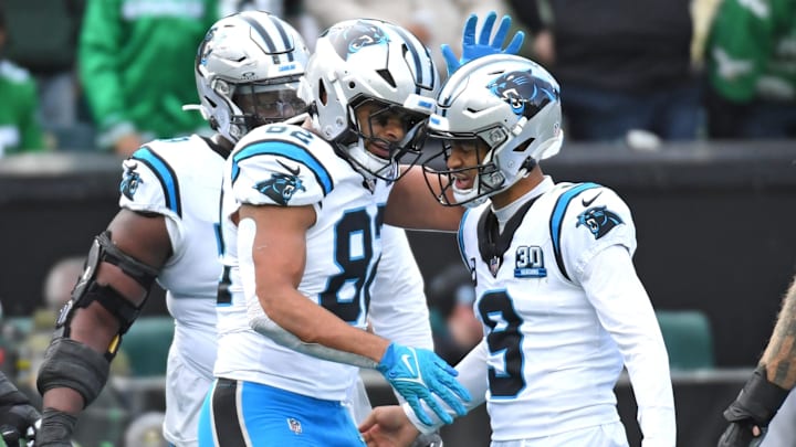 Dec 8, 2024; Philadelphia, Pennsylvania, USA; Carolina Panthers tight end Tommy Tremble (82) celebrates his touchdown catch with quarterback Bryce Young (9) against the Philadelphia Eagles during the second quarter at Lincoln Financial Field. Mandatory Credit: Eric Hartline-Imagn Images