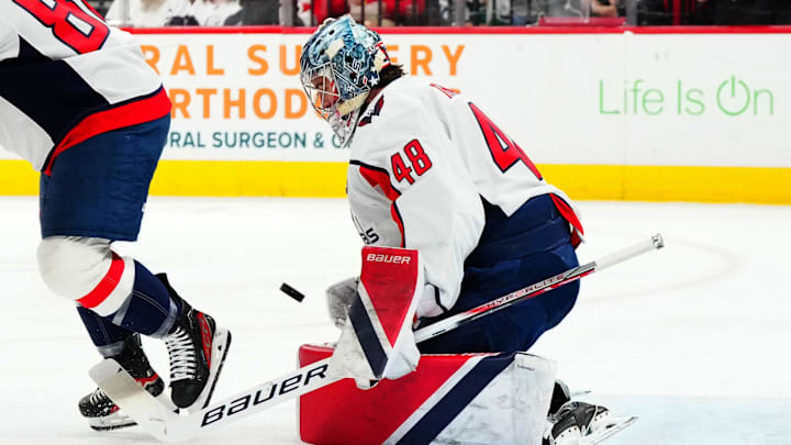 Washington Capitals goaltender Logan Thompson (48) stops a shot against the Carolina Hurricanes.