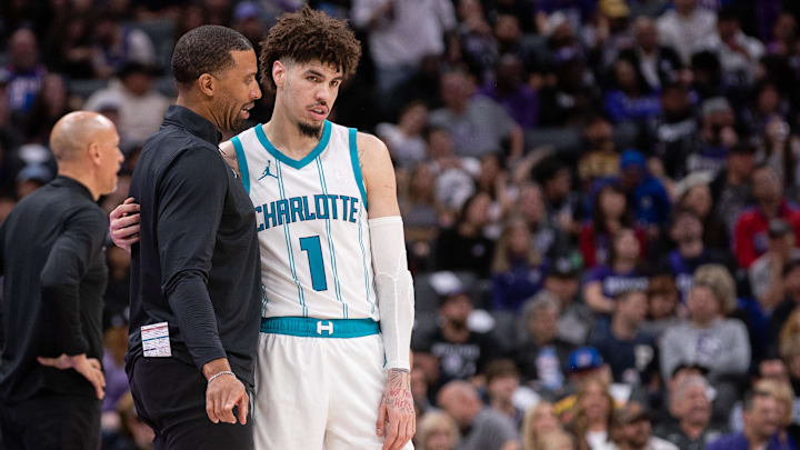 Feb 24, 2025; Sacramento, California, USA; Charlotte Hornets head coach Charles Lee talks with guard LaMelo Ball (1) during a time out in the fourth quarter of the game against the Sacramento Kings at Golden 1 Center. Mandatory Credit: Ed Szczepanski-Imagn Images Feb 24, 2025; Sacramento, California, USA; Charlotte Hornets head coach Charles Lee talks with guard LaMelo Ball (1) during a time out in the fourth quarter of the game against the Sacramento Kings at Golden 1 Center. Mandatory Credit: Ed Szczepanski-Imagn Images