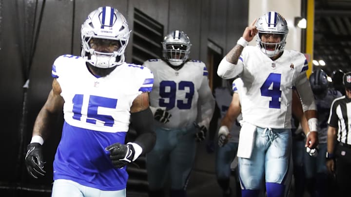 Dallas Cowboys running back Ezekiel Elliott and quarterback Dak Prescott take the field to play the Pittsburgh Steelers at Acrisure Stadium.