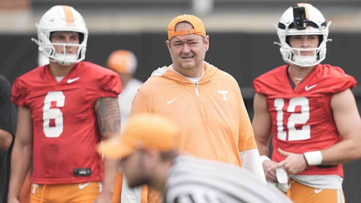 Tennessee quarterback Joey Aguilar (6) Tennessee head coach Josh Heupel and Tennessee quarterback Jake Merklinger (12) during Tennessee football preseason practice, in Knoxville, Tennessee, July 31, 2025.