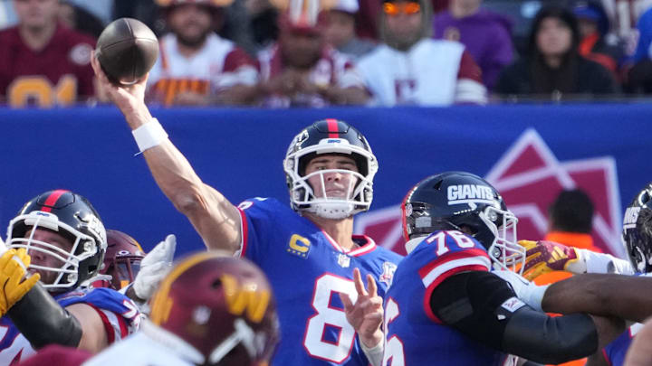 Nov 3, 2024; East Rutherford, New Jersey, USA; New York Giants quarterback Daniel Jones (8) throws against the Washington Commanders during the first half at MetLife Stadium. 