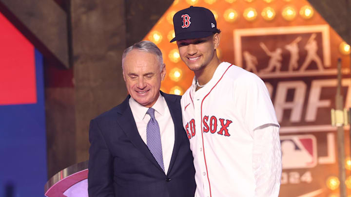 MLB commissioner Rob Manfred takes a photo with Braden Montgomery after he was drafted by the Boston Red Sox with the No. 12 pick during the first round of the MLB Draft in Fort Worth, Texas, on July 14, 2024. MLB commissioner Rob Manfred takes a photo with Braden Montgomery after he was drafted by the Boston Red Sox with the No. 12 pick during the first round of the MLB Draft in Fort Worth, Texas, on July 14, 2024.