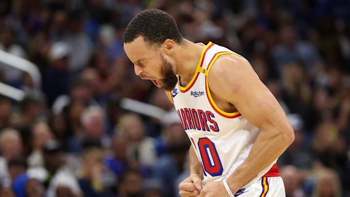 Stephen Curry reacts to a basket against the Orlando Magic.