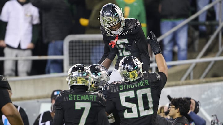 Nov 30, 2024; Eugene, Oregon, USA; Oregon Ducks wide receiver Tez Johnson (15) celebrates catching a touchdown pass during the second half against the Washington Huskies at Autzen Stadium. Mandatory Credit: Troy Wayrynen-Imagn Images