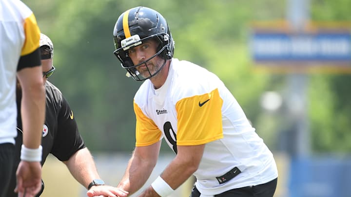 Jun 10, 2025; Pittsburgh, PA, USA;  Pittsburgh Steelers quarterback Aaron Rogers (8) takes a snap during minicamp at their South Side facility. Mandatory Credit: Philip G. Pavely-Imagn Images