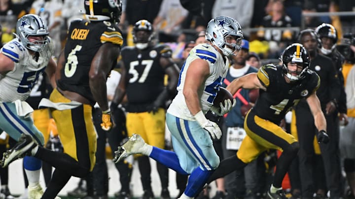 Dallas Cowboys running back Hunter Luepke rushes for a huge gain against the Pittsburgh Steelers at Acrisure Stadium 