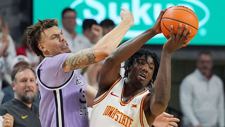 Iowa State Cyclones guard Demarion Watson (4) steals the ball from Kansas State Wildcats' forward Coleman Hawkins (33) during the second half in the Big-12 men’s basketball showdown at Hilton Coliseum on Feb 1, 2025 in Ames, Iowa.