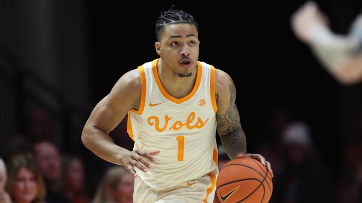 Tennessee Volunteers guard Amari Evans dribbles against the Texas A&M Aggies during the first half at Thompson-Boling Arena at Food City Center. 