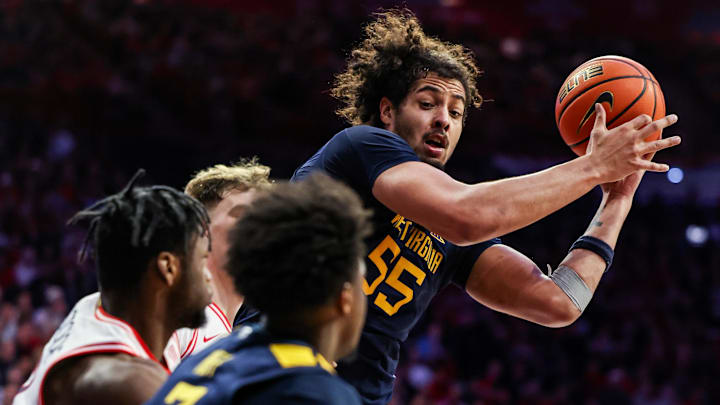 Jan 24, 2026; Tucson, Arizona, USA; West Virginia Mountaineers center Harland Obioha (55) catches the ball during the second half of the game against the Arizona Wildcats at McKale Memorial Center. Mandatory Credit: Aryanna Frank-Imagn Images Jan 24, 2026; Tucson, Arizona, USA; West Virginia Mountaineers center Harland Obioha (55) catches the ball during the second half of the game against the Arizona Wildcats at McKale Memorial Center. Mandatory Credit: Aryanna Frank-Imagn Images