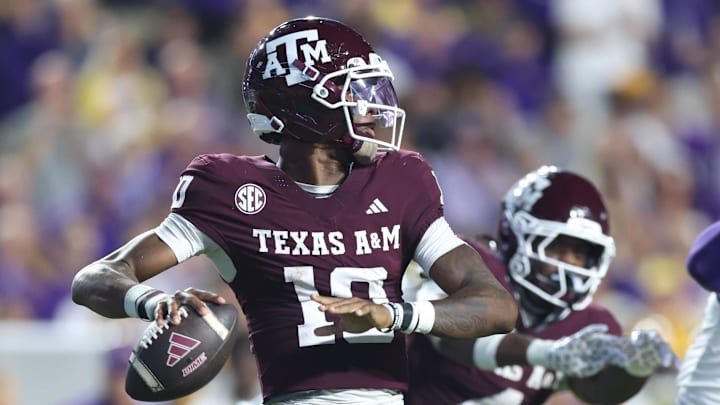 Texas A&M Aggies quarterback Marcel Reed drops to throw during the first half against the Louisiana State Tigers at Tiger Stadium. Texas A&M Aggies quarterback Marcel Reed drops to throw during the first half against the Louisiana State Tigers at Tiger Stadium.