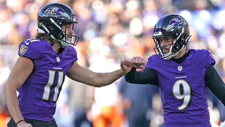 Nov 3, 2024; Baltimore, Maryland, USA; Baltimore Ravens kicker Justin Tucker (9) greeted by placeholder Jordan Stout (11) following his fourth quarter field goal against the Denver Broncos at M&T Bank Stadium. Mandatory Credit: Mitch Stringer-Imagn Images