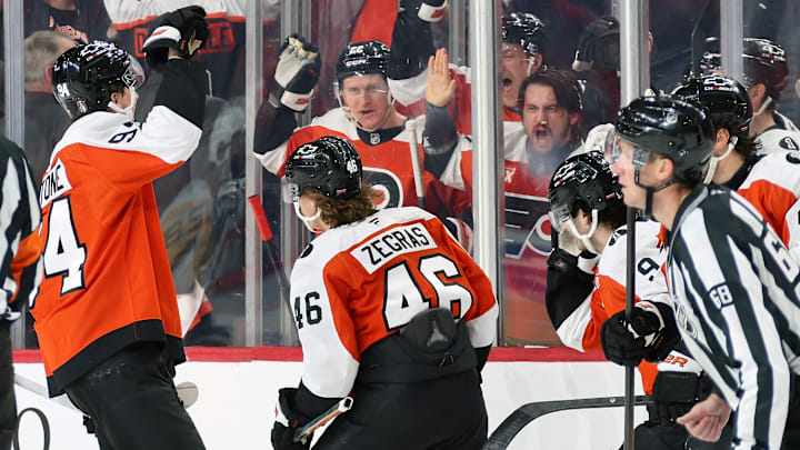 PHILADELPHIA, PENNSYLVANIA - APRIL 22: Christian Dvorak #22, Travis Konecny #11, Travis Sanheim #6, Porter Martone #94 and Jamie Drysdale #9 of the Philadelphia Flyers celebrate Trevor Zegras #46 second period goal against the Pittsburgh Penguins in Game Three of the First Round of the 2026 Stanley Cup Playoffs at the Xfinity Mobile Arena on April 22, 2026 in Philadelphia, Pennsylvania. (Photo by Len Redkoles/NHLI via Getty Images)
