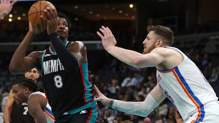 Nov 9, 2025; Memphis, Tennessee, USA; Memphis Grizzlies forward/center Jaren Jackson Jr. (8) shoots as Oklahoma City Thunder center Isaiah Hartenstein (55) defends during the fourth quarter at FedExForum. Mandatory Credit: Petre Thomas-Imagn Images