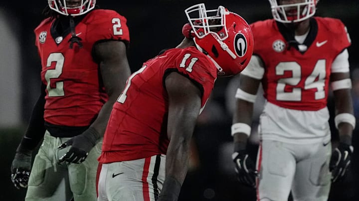 Georgia linebacker Jalon Walker (11) celebrates after sacking Tennessee quarterback Nico Iamaleava (8) during the second half of a NCAA college football game against Tennessee in Athens, Ga., on Saturday, Nov. 16, 2024.
