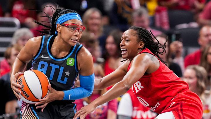 Indiana Fever guard Kelsey Mitchell (0) guards Atlanta Dream guard Allisha Gray (15) on Friday, July 11, 2025, during a game between the Indiana Fever and the Atlanta Dream at Gainbridge Fieldhouse in Indianapolis. The Indiana Fever defeated the Atlanta Dream, 99-82.