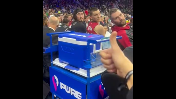 Kevin Love, Tyler Herro and Jaime Jaquez Jr. talk with fan after news of the Jimmy Butler trade breaks.