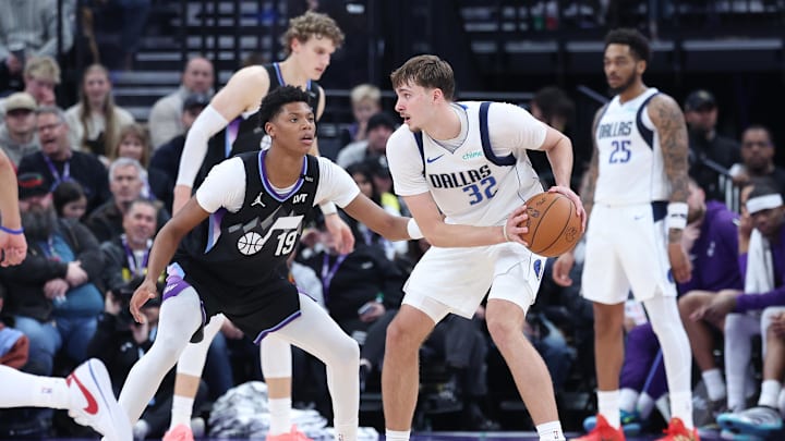 Dec 15, 2025; Salt Lake City, Utah, USA; Dallas Mavericks forward Cooper Flagg (32) holds the ball as Utah Jazz guard Ace Bailey (19) defends at Delta Center. Mandatory Credit: Rob Gray-Imagn Images Dec 15, 2025; Salt Lake City, Utah, USA; Dallas Mavericks forward Cooper Flagg (32) holds the ball as Utah Jazz guard Ace Bailey (19) defends at Delta Center. Mandatory Credit: Rob Gray-Imagn Images