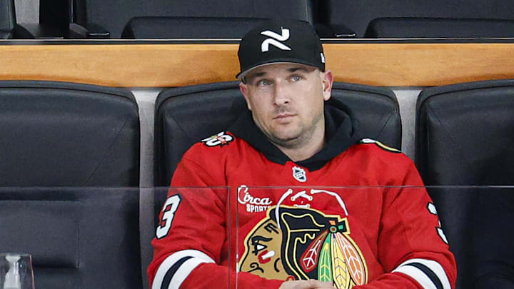 Jan 12, 2026; Chicago, Illinois, USA; Chicago Cubs third baseman Alex Bregman watches an NHL game between the Chicago Blackhawks and Edmonton Oilers during the third period at United Center. Mandatory Credit: Kamil Krzaczynski-Imagn Images