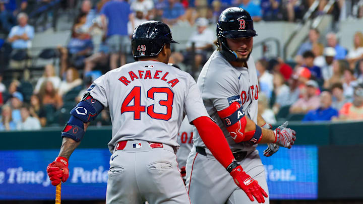 Aug 4, 2024; Arlington, Texas, USA; Boston Red Sox right fielder Wilyer Abreu (52) celebrates with Boston Red Sox shortstop Ceddanne Rafaela (43) after hitting a three-run home run during the sixth inning against the Texas Rangers at Globe Life Field. Mandatory Credit: Kevin Jairaj-Imagn Images