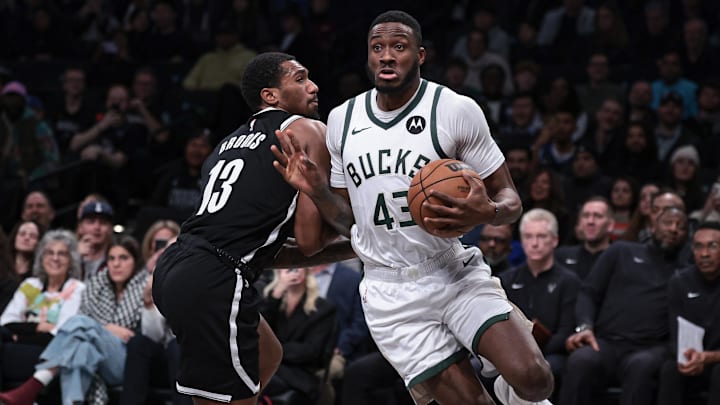 Dec 27, 2023; Brooklyn, New York, USA: Milwaukee Bucks forward Thanasis Antetokounmpo (43) drives to the basket against Brooklyn Nets guard Armoni Brooks (13) during the second half at Barclays Center. Mandatory Credit: Vincent Carchietta-Imagn Images Dec 27, 2023; Brooklyn, New York, USA: Milwaukee Bucks forward Thanasis Antetokounmpo (43) drives to the basket against Brooklyn Nets guard Armoni Brooks (13) during the second half at Barclays Center. Mandatory Credit: Vincent Carchietta-Imagn Images