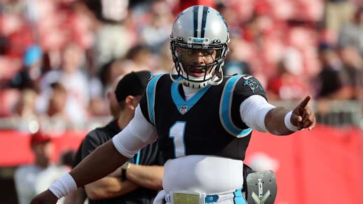 Jan 9, 2022; Tampa, Florida, USA;Carolina Panthers quarterback Cam Newton (1) against the Tampa Bay Buccaneers prior to the game at Raymond James Stadium. Mandatory Credit: Kim Klement-Imagn Images