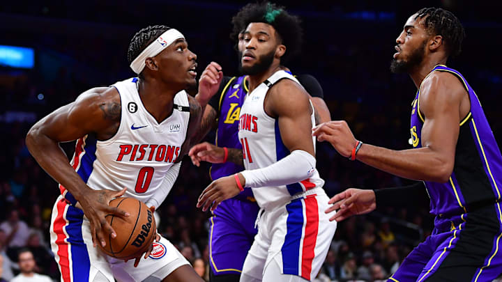 Nov 18, 2022; Los Angeles, California, USA; Detroit Pistons center Jalen Duren (0) moves to the basket against Los Angeles Lakers forward Troy Brown Jr. (7) during the first half at Crypto.com Arena. Mandatory Credit: Gary A. Vasquez-Imagn Images