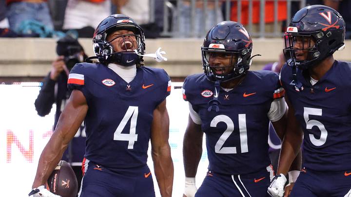 Sep 11, 2026; Charlottesville, Virginia, USA; Virginia Cavaliers wide receiver Jacquon Gibson (4) celebrates after scoring a touchdown during the first quarter against the Norfolk State Spartans at Scott Stadium. Mandatory Credit: Amber Searls-Imagn Images Sep 11, 2026; Charlottesville, Virginia, USA; Virginia Cavaliers wide receiver Jacquon Gibson (4) celebrates after scoring a touchdown during the first quarter against the Norfolk State Spartans at Scott Stadium. Mandatory Credit: Amber Searls-Imagn Images