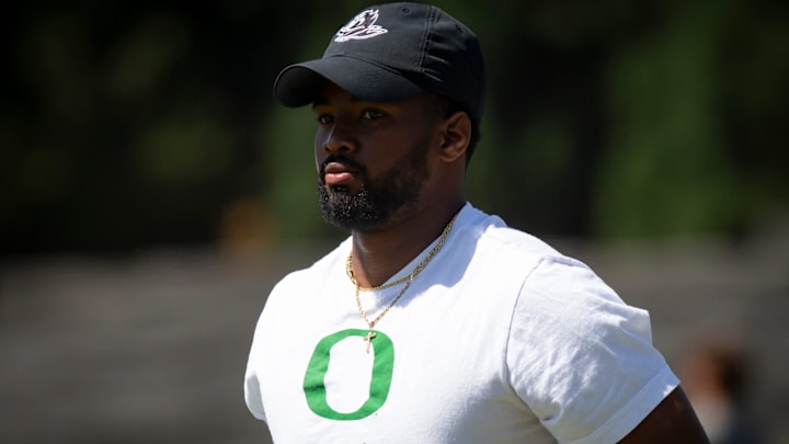 Oregon running backs coach Ra'Shaad Samples works with the team during the Ducks’ fall camp Tuesday, Aug. 6, 2024, at the Hatfield-Dowlin Complex in Eugene, Ore.