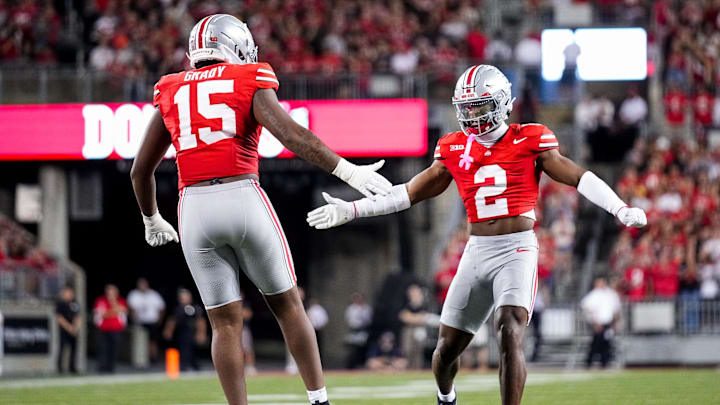 Ohio State Buckeyes defensive lineman Zion Grady (15) celebrates with defensive back Caleb Downs (2) in the second half of the NCAA football game at Ohio Stadium on Saturday, Oct. 4, 2025 in Columbus, Ohio. Ohio State Buckeyes defensive lineman Zion Grady (15) celebrates with defensive back Caleb Downs (2) in the second half of the NCAA football game at Ohio Stadium on Saturday, Oct. 4, 2025 in Columbus, Ohio.
