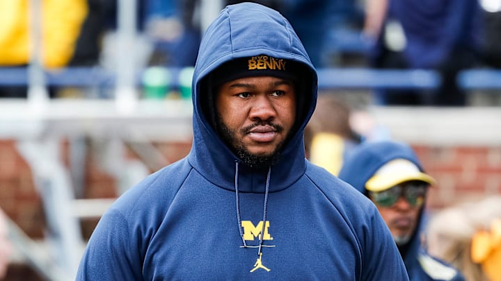 Michigan defensive lineman Rayshaun Benny (26) watches warmup during the spring game at Michigan Stadium in Ann Arbor on Saturday, April 20, 2024.