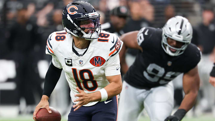 Caleb Williams is flushed out of the pocket during the game-winning drive against the Raiders. Caleb Williams is flushed out of the pocket during the game-winning drive against the Raiders.