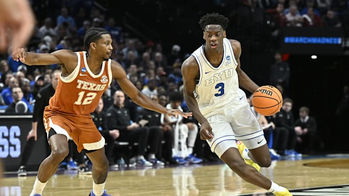 Mar 19, 2026; Portland, OR, USA; BYU Cougars forward AJ Dybantsa (3) drives against Texas Longhorns guard Tramon Mark (12) in the first half during a first round game of the men's 2026 NCAA Tournament at Moda Center. Mandatory Credit: Craig Strobeck-Imagn Images
