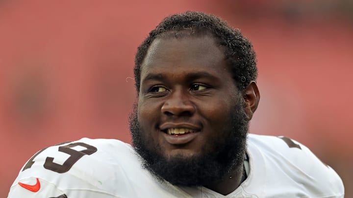 Cleveland Browns offensive tackle Dawand Jones (79) is all smiles after an NFL preseason football game at Cleveland Browns Stadium, Saturday, Aug. 10, 2024, in Cleveland, Ohio.