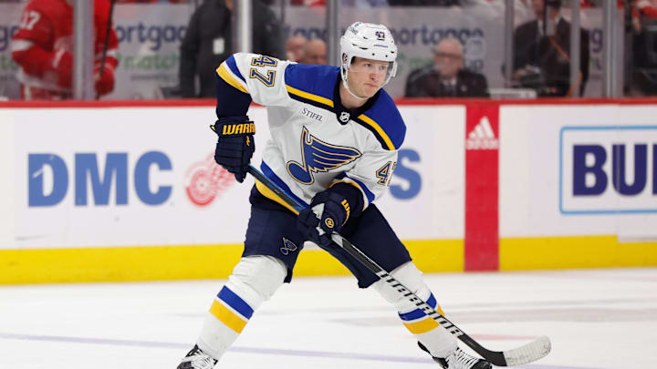 Feb 24, 2024; Detroit, Michigan, USA;  St. Louis Blues defenseman Torey Krug (47) skates with the puck in the third period against the Detroit Red Wings at Little Caesars Arena. Mandatory Credit: Rick Osentoski-Imagn Images