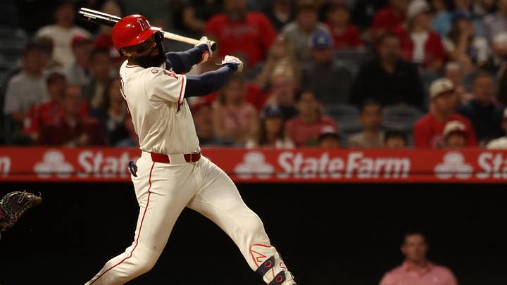 Jun 13, 2026; Anaheim, California, USA;  Los Angeles Angels right fielder Jo Adell (7) hits a single during the sixth inning against the Tampa Bay Rays at Angel Stadium. Mandatory Credit: Kiyoshi Mio-Imagn Images