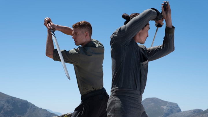 Rand (Josha Stradowski) and Lan (Daniel Henney) in The Wheel of Time season 3