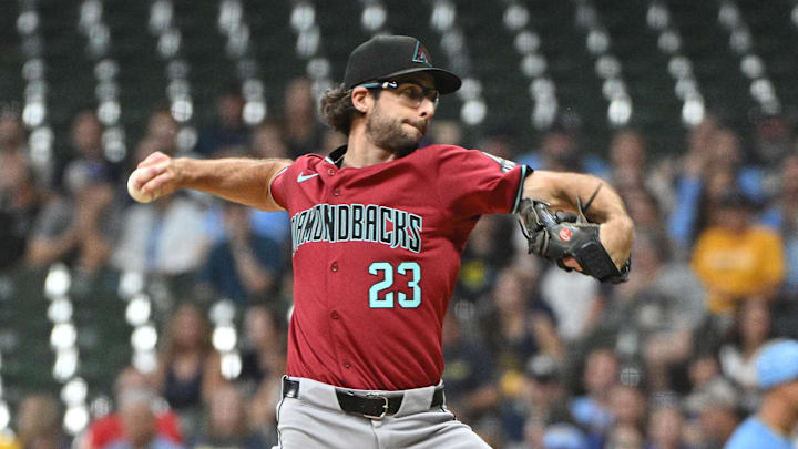Sep 20, 2024; Milwaukee, Wisconsin, USA; Arizona Diamondbacks pitcher Zac Gallen (23) delivers a pitch against the Milwaukee Brewers in the first inning  at American Family Field. Mandatory Credit: Michael McLoone-Imagn Images