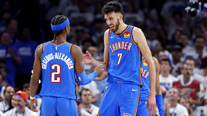 May 28, 2025; Oklahoma City, Oklahoma, USA; Oklahoma City Thunder forward Chet Holmgren (7) and guard Shai Gilgeous-Alexander (2) celebrates during the second quarter against the Minnesota Timberwolves in game five of the western conference finals for the 2025 NBA Playoffs at Paycom Center. Mandatory Credit: Alonzo Adams-Imagn Images