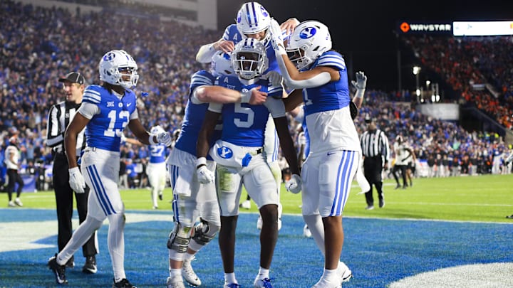 Darius Lassiter celebrates a game-winning touchdown in the final moment of BYU's comeback victory over Oklahoma State.