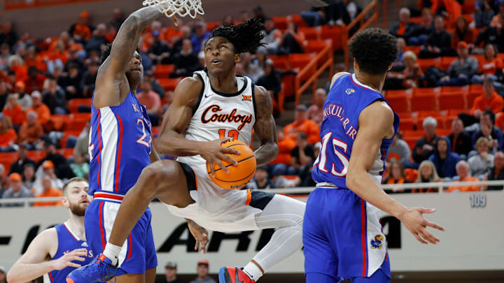 Oklahoma State Cowboys guard Javon Small (12) goes to the basket against the Kansas Jayhawks