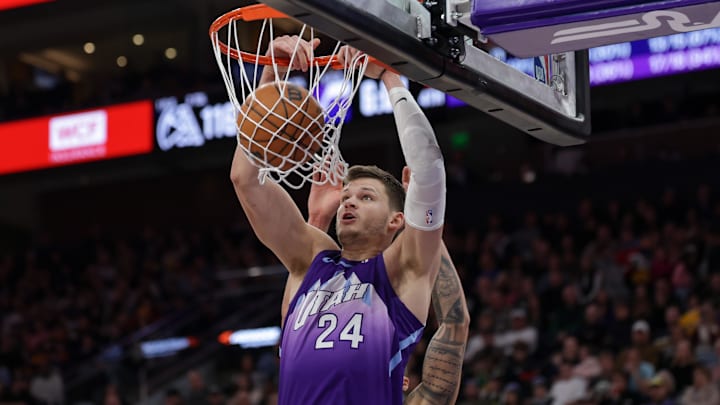 Dec 30, 2024; Salt Lake City, Utah, USA;  Utah Jazz center Walker Kessler (24) dunks the ball during the second half against the Denver Nuggets at Delta Center. Mandatory Credit: Chris Nicoll-Imagn Images